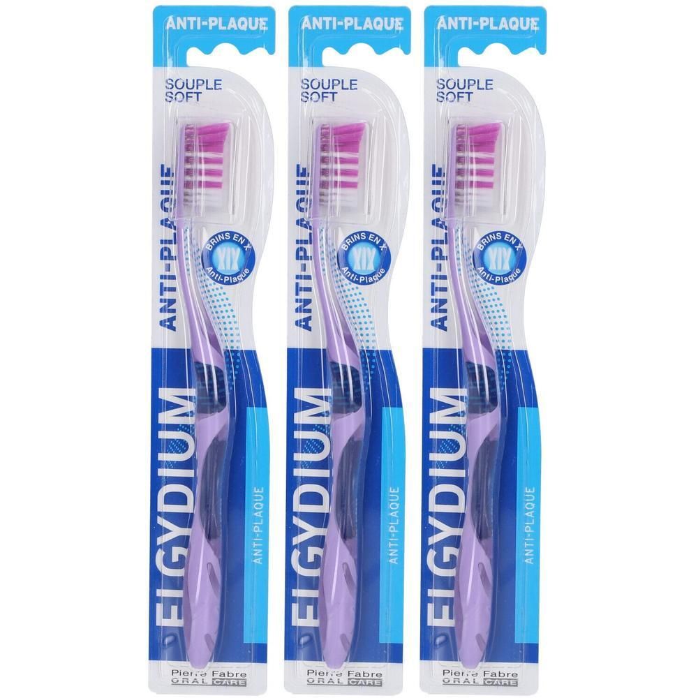 Trois brosses à dents Elgydium Anti-Plaque souples, manches et têtes violettes.