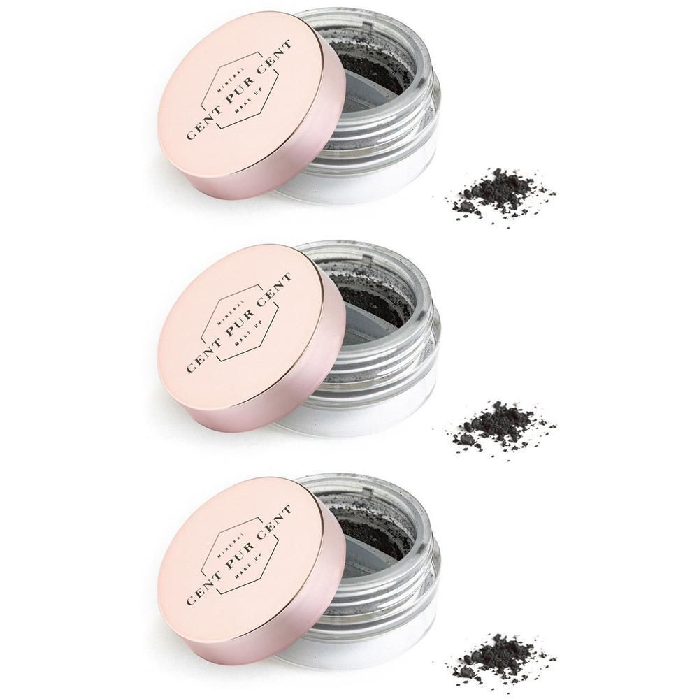 Trois pots ouverts de poudre minérale noire, avec de petites quantités de poudre à côté.