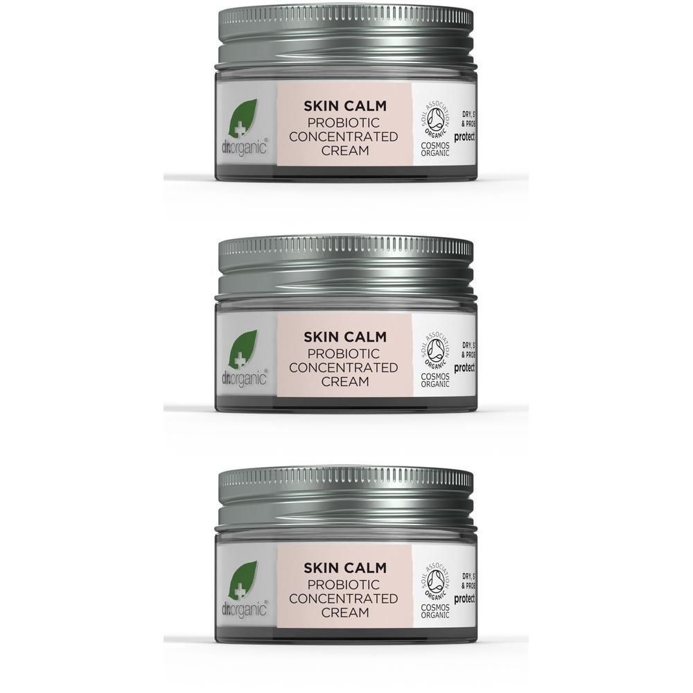 Drie potjes crème met zilverkleurige deksels, met het etiket 'Skin Calm Probiotic Concentrated Cream'.