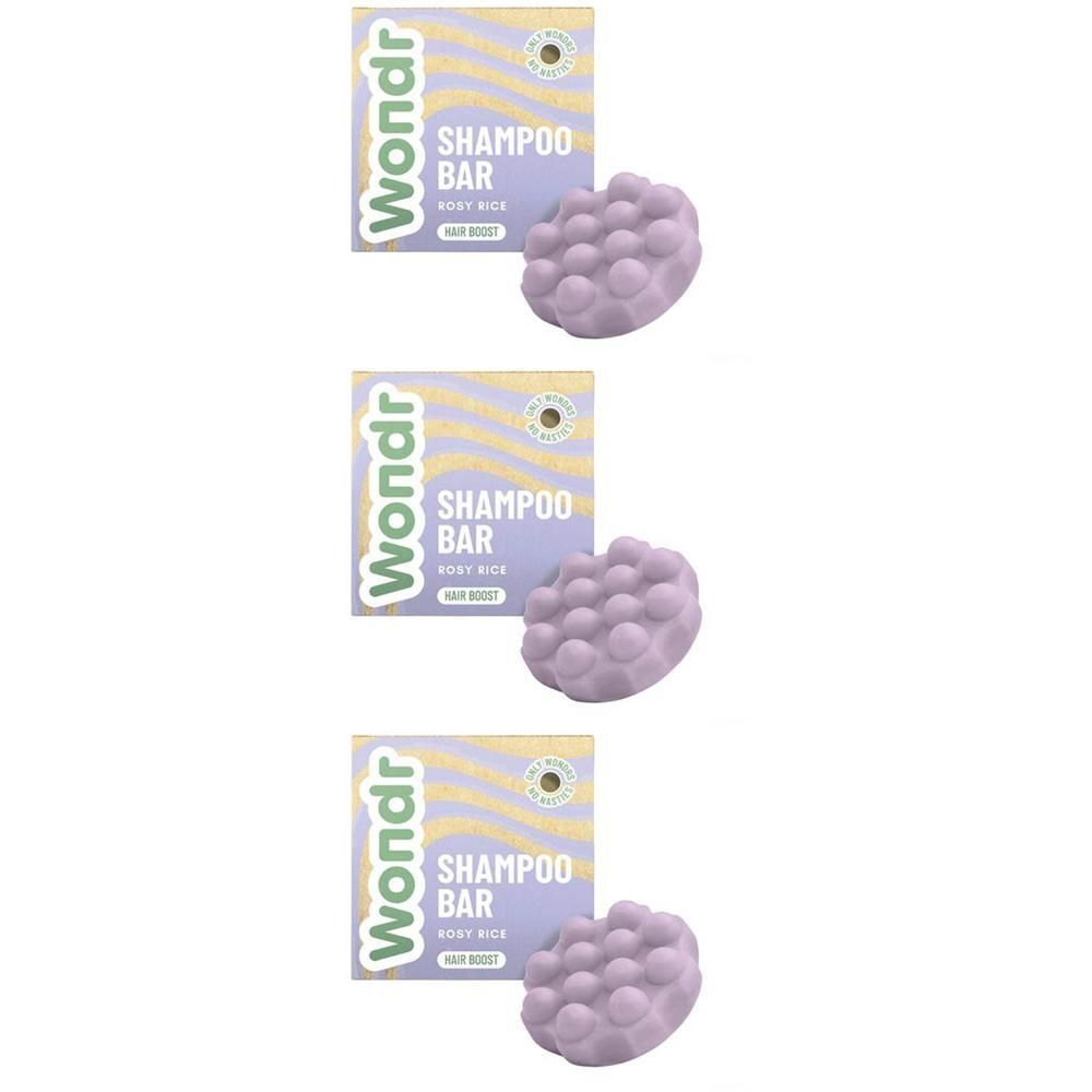 Wondr Shampoo Bar Rosy Rice: Paarse shampoobar met parelstructuur, naast een verpakking met golvend patroon.