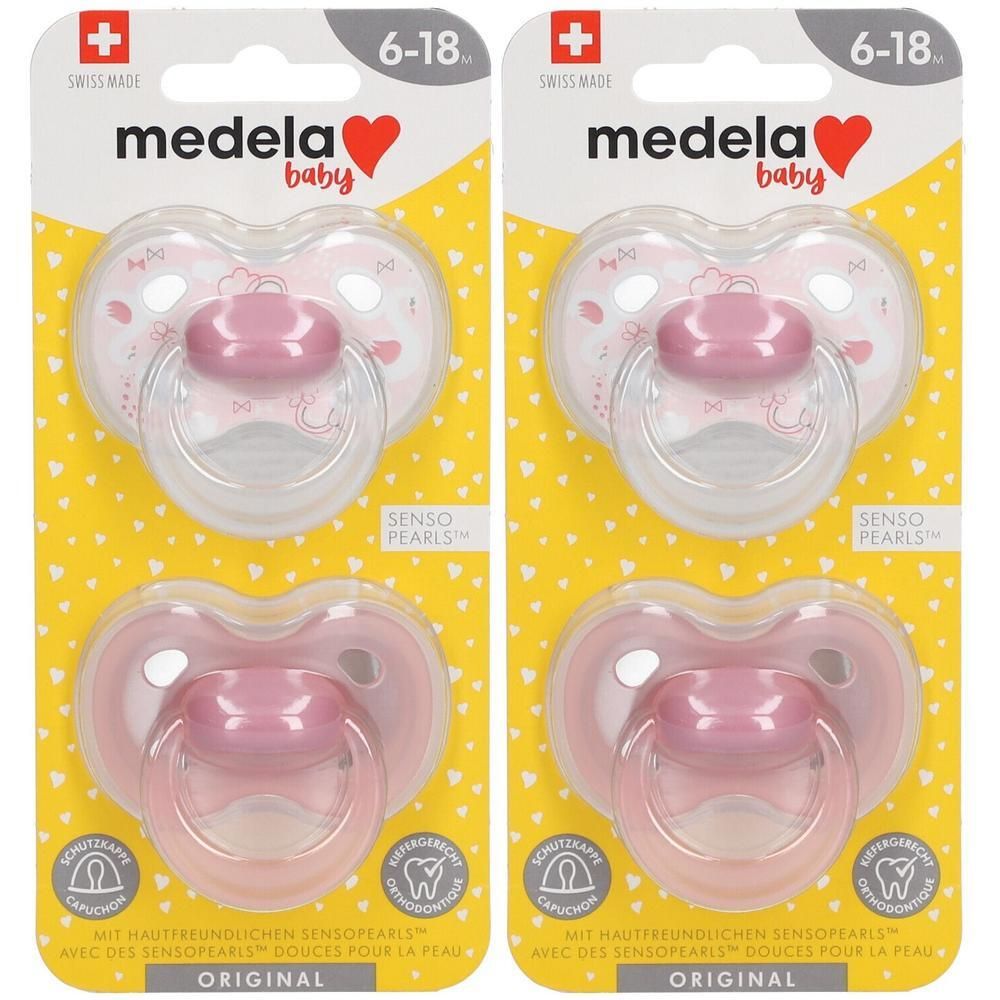 Twee roze Medela Original fopspenen voor 6-18 maanden met beschermkap en orthodontische speen.