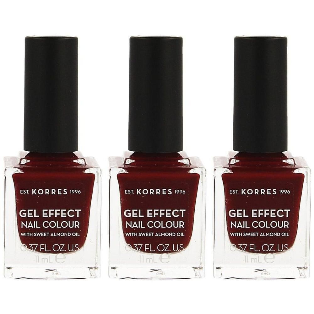 Trois flacons de vernis à ongles Korres Gel Effect couleur rouge vin avec bouchons noirs.