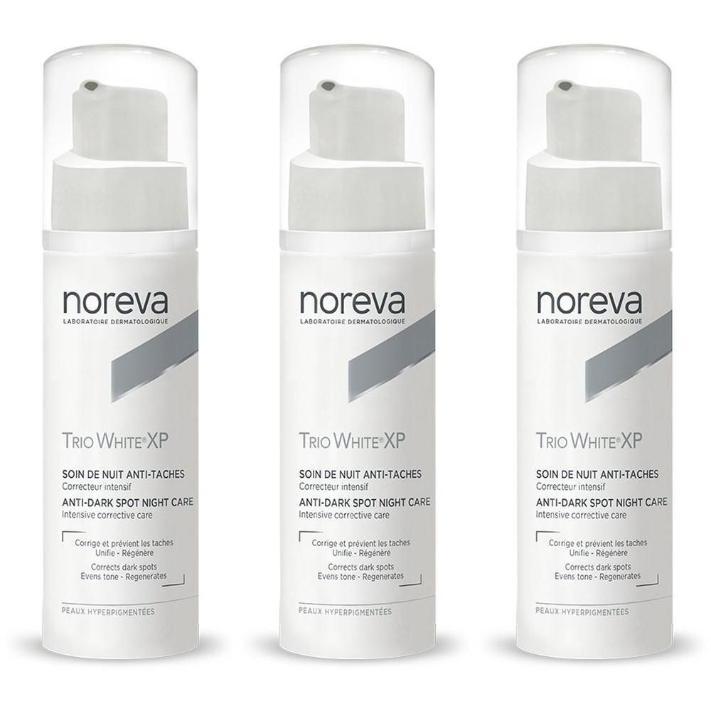 Drie Noreva Trio White XP flacons met pompdose. Witte flacons met grijze band en zwarte tekst.