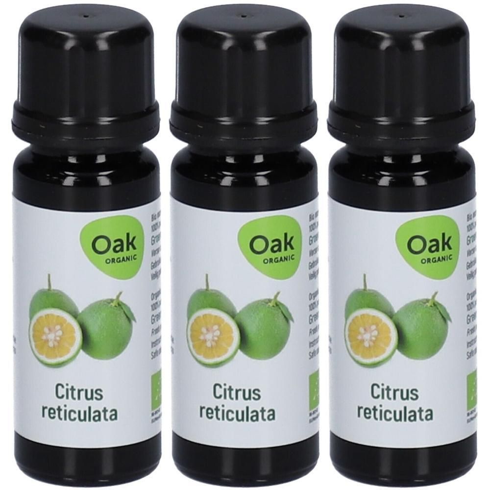 Trois flacons d'huile essentielle Oak Organic Citrus reticulata. Mandarines vertes représentées.