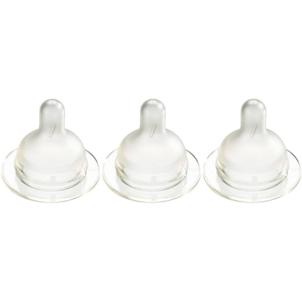 Trois tétines transparentes en silicone à col large.