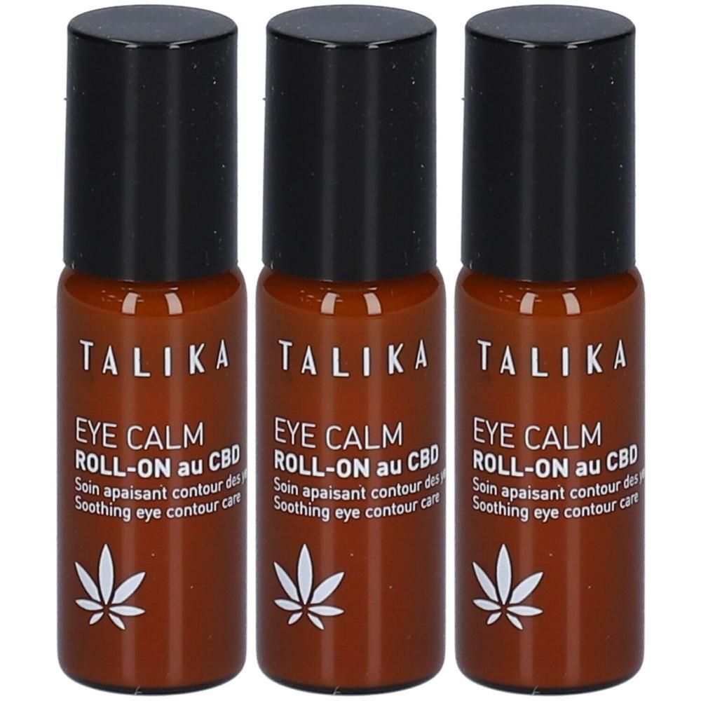 Trois roll-ons Talika Eye Calm au CBD. Flacons en verre brun avec bouchons noirs et étiquettes blanches.