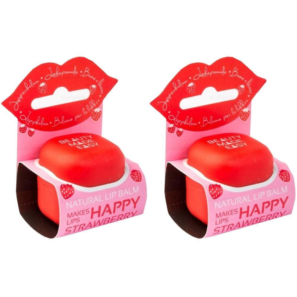 Deux emballages de baume à lèvres rouge avec motif fraise. "Natural Lip Balm" et "Makes Happy Lips Strawberry" sont imprimés.