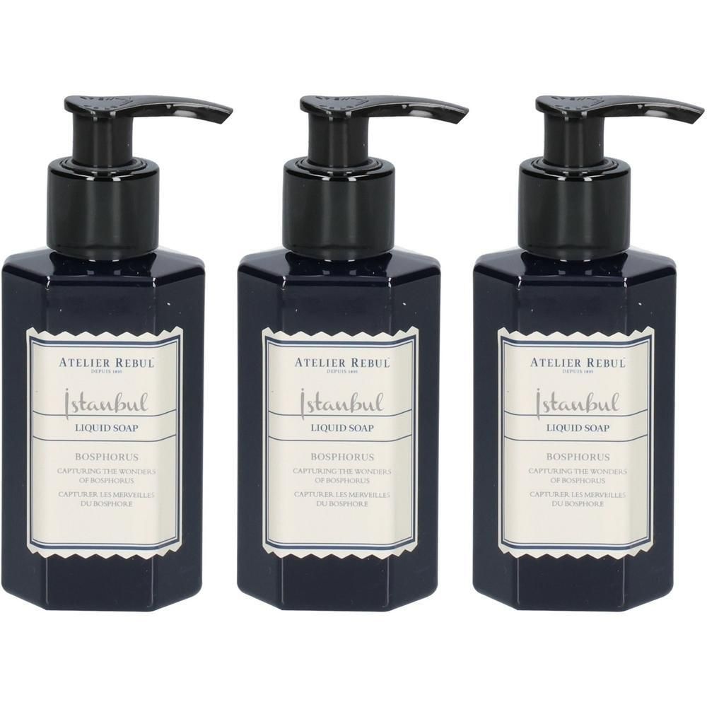 Trois flacons distributeurs bleu foncé avec pompe noire, remplis de savon liquide.