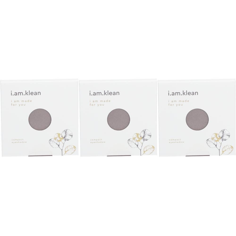 Drie i.am.klean Compact Mineral Eyeshadow Grateful in witte verpakkingen met ronde kijkgaten.