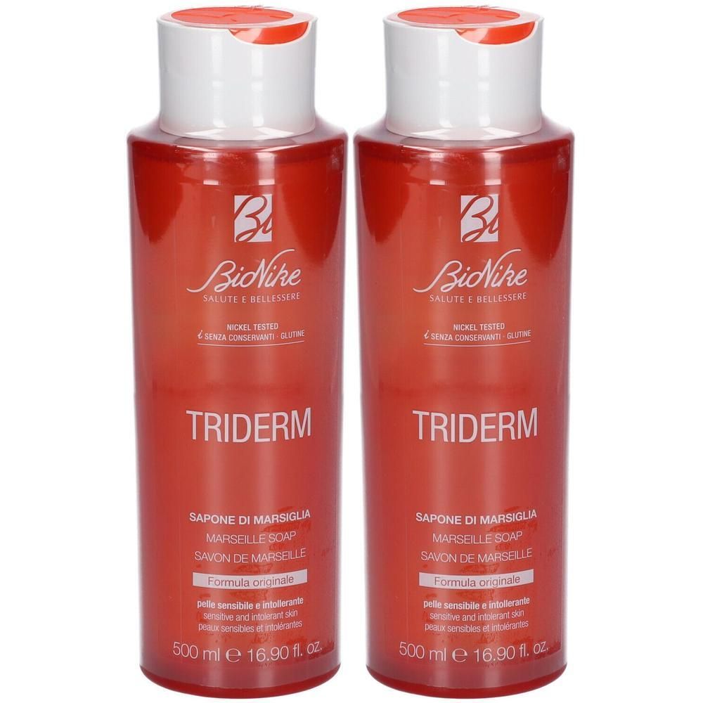 Twee rode flessen Bionike Triderm Marseille zeep, elk 500 ml.