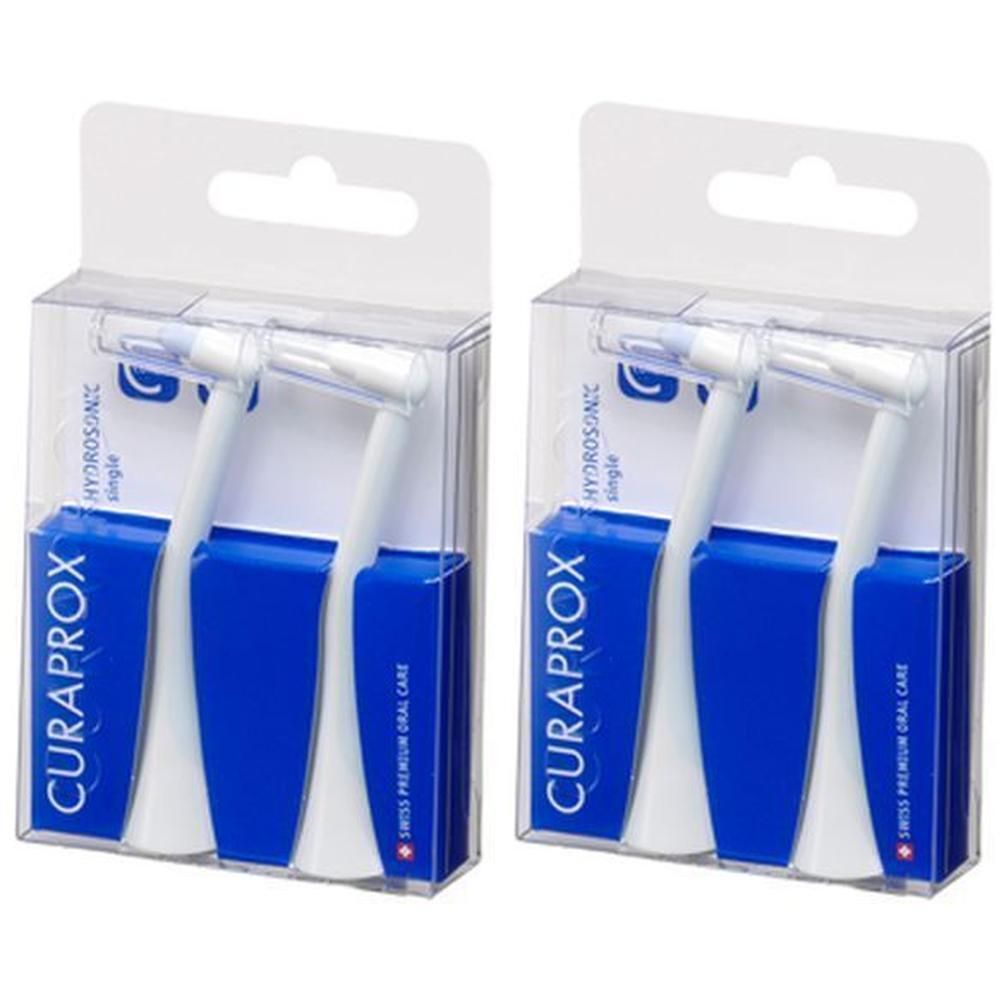 Deux têtes de brosse Curaprox Hydrosonic Pro Single dans un emballage transparent avec inserts bleus.