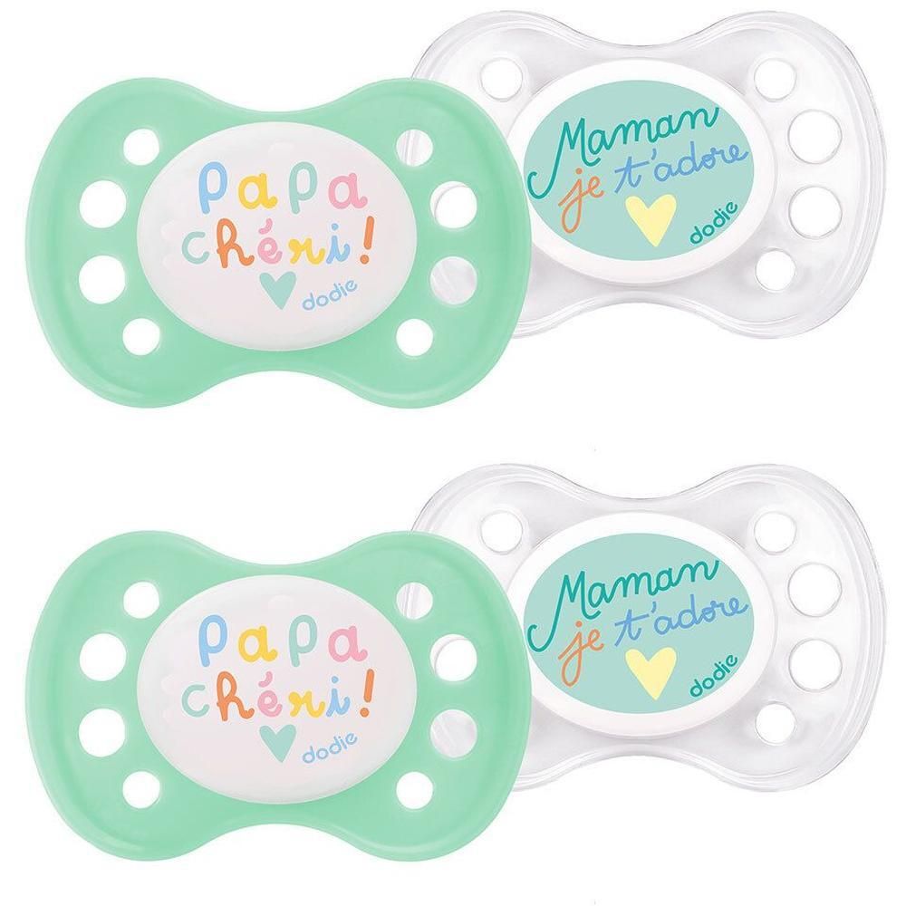 Deux sucettes anatomiques : une verte "Papa chéri!", une transparente "Maman je t'adore".