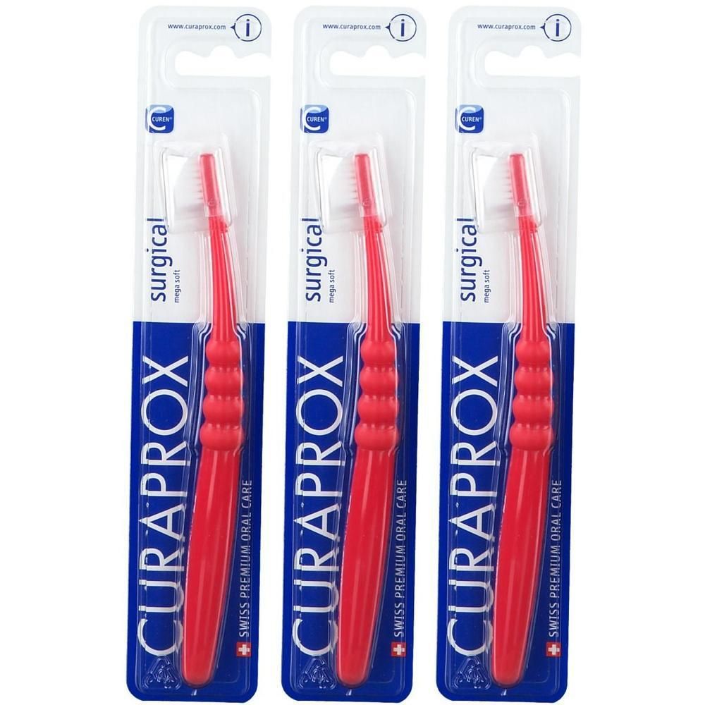 Drie rode Curaprox tandenborstels, "surgical mega soft" opschrift.