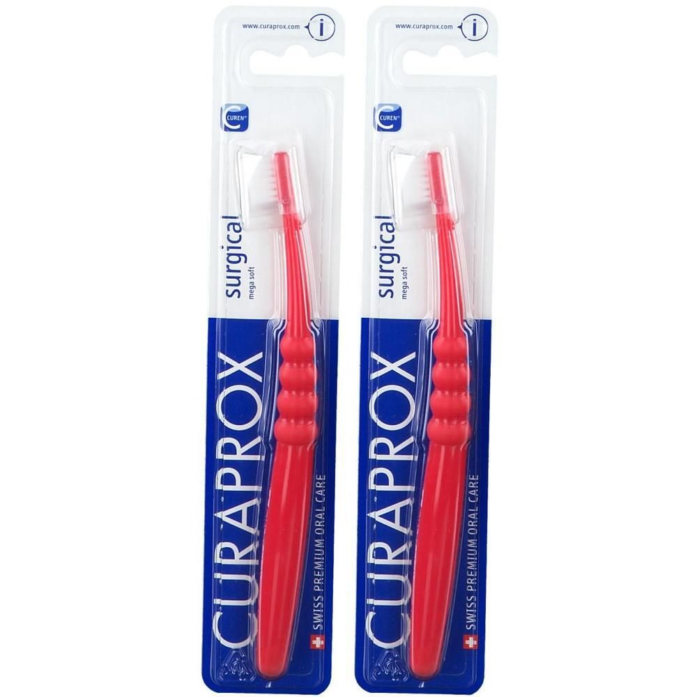 Twee rode Curaprox tandenborstels, Surgical mega soft, in blisterverpakking.
