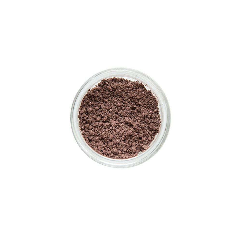 Vue de dessus d'un pot en verre ouvert avec couvercle rose doré, rempli de poudre minérale.