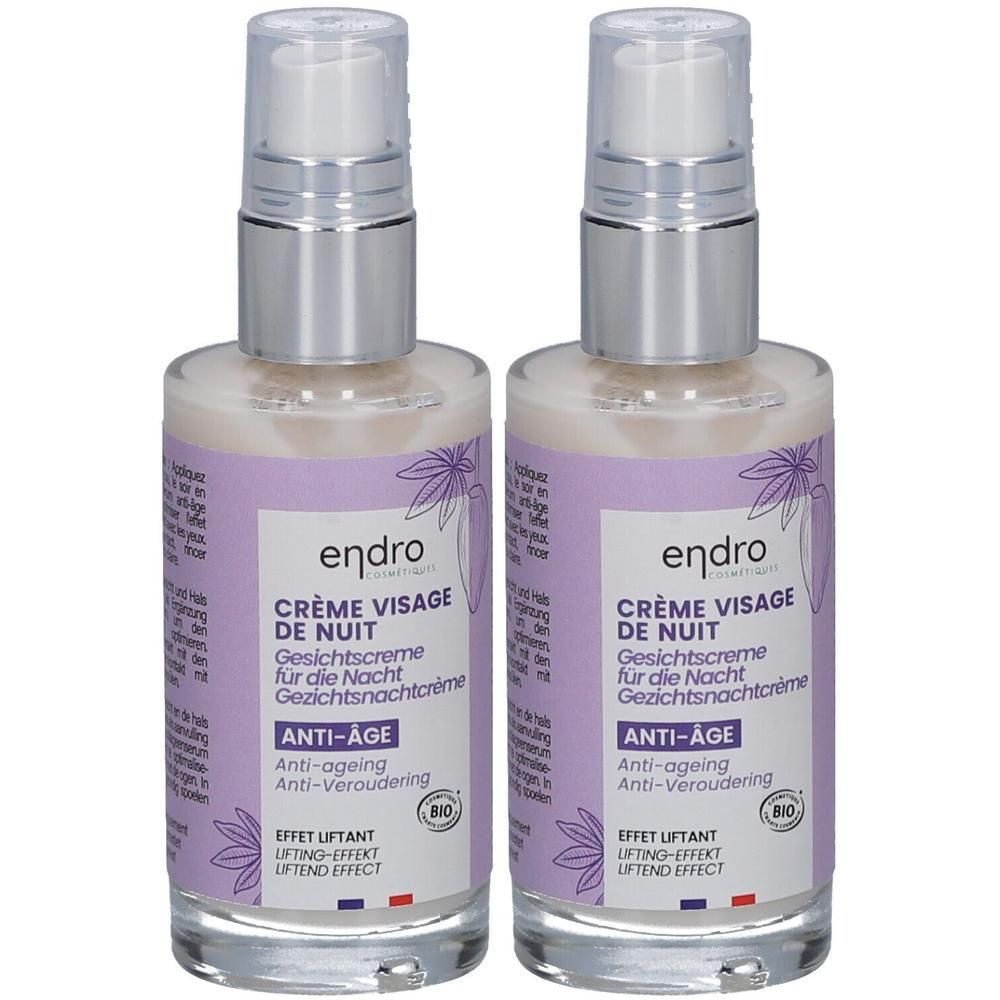 Twee flessen Endro anti-aging nachtcrème met pompdispenser. Heldere glazen flacons met paars etiket.