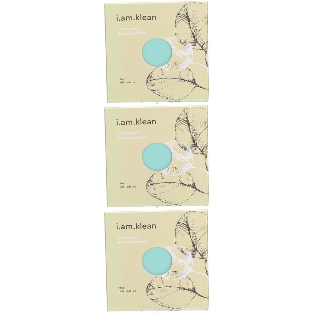 Trois fards à paupières minéraux compacts i.am.klean bleu clair, emballés dans des boîtes à motifs de feuilles.