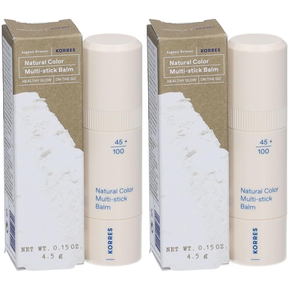 Twee Korres Natural Color Multi-stick Balms in beige tubes met kartonnen verpakking.