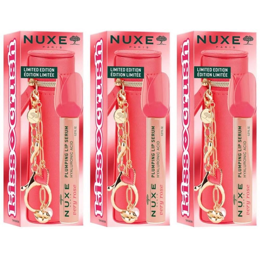 Trois coffrets de baume à lèvres Nuxe avec breloque, emballage rose. Édition limitée.
