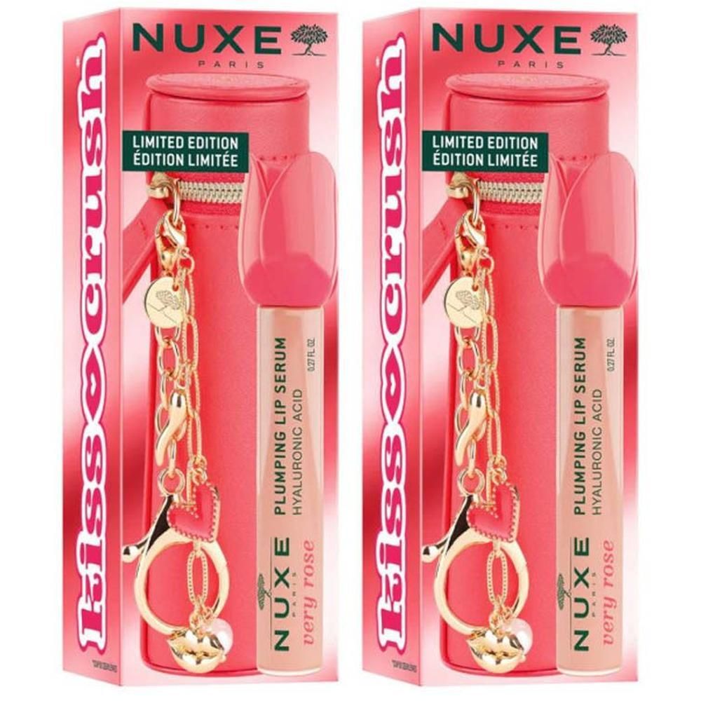 Nuxe lipverzorgingsset met sleutelhanger. Bevat twee lippenbalsems in roze verpakking.