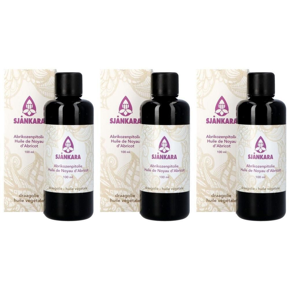Trois flacons noirs d'huile de noyau d'abricot, chacun de 100 ml.