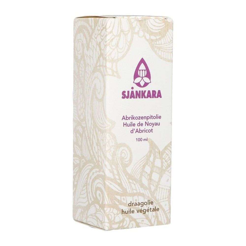 Verpakking van SJÄNKARA abrikozenpitolie, 100 ml, met bloemenpatroon.