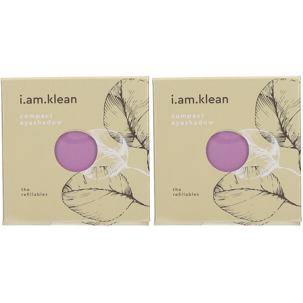 Deux fards à paupières compacts i.am.klean "Meadow" dans leur emballage. Recharges de fard à paupières violettes visibles.