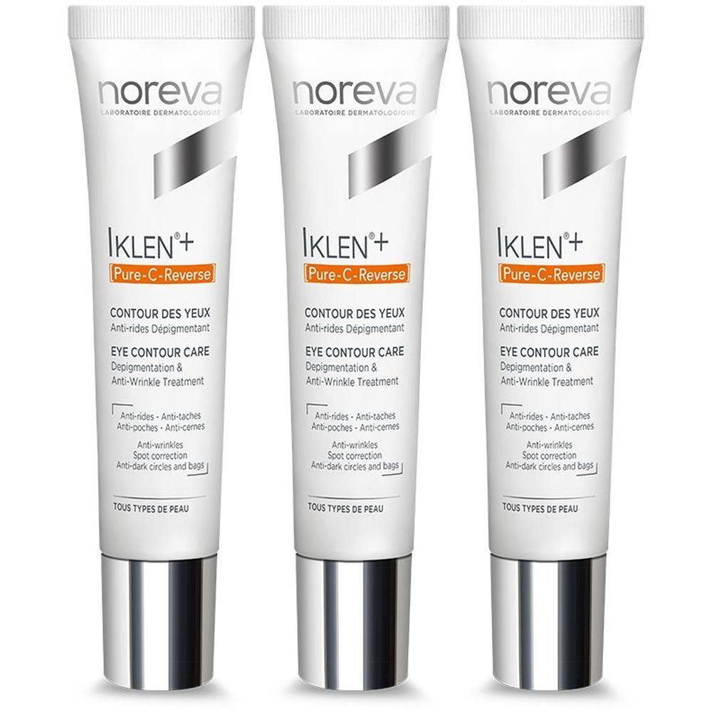 Drie Noreva Iklen+ Pure-C-Reverse oogcontourcrème tubes met zilveren doppen.
