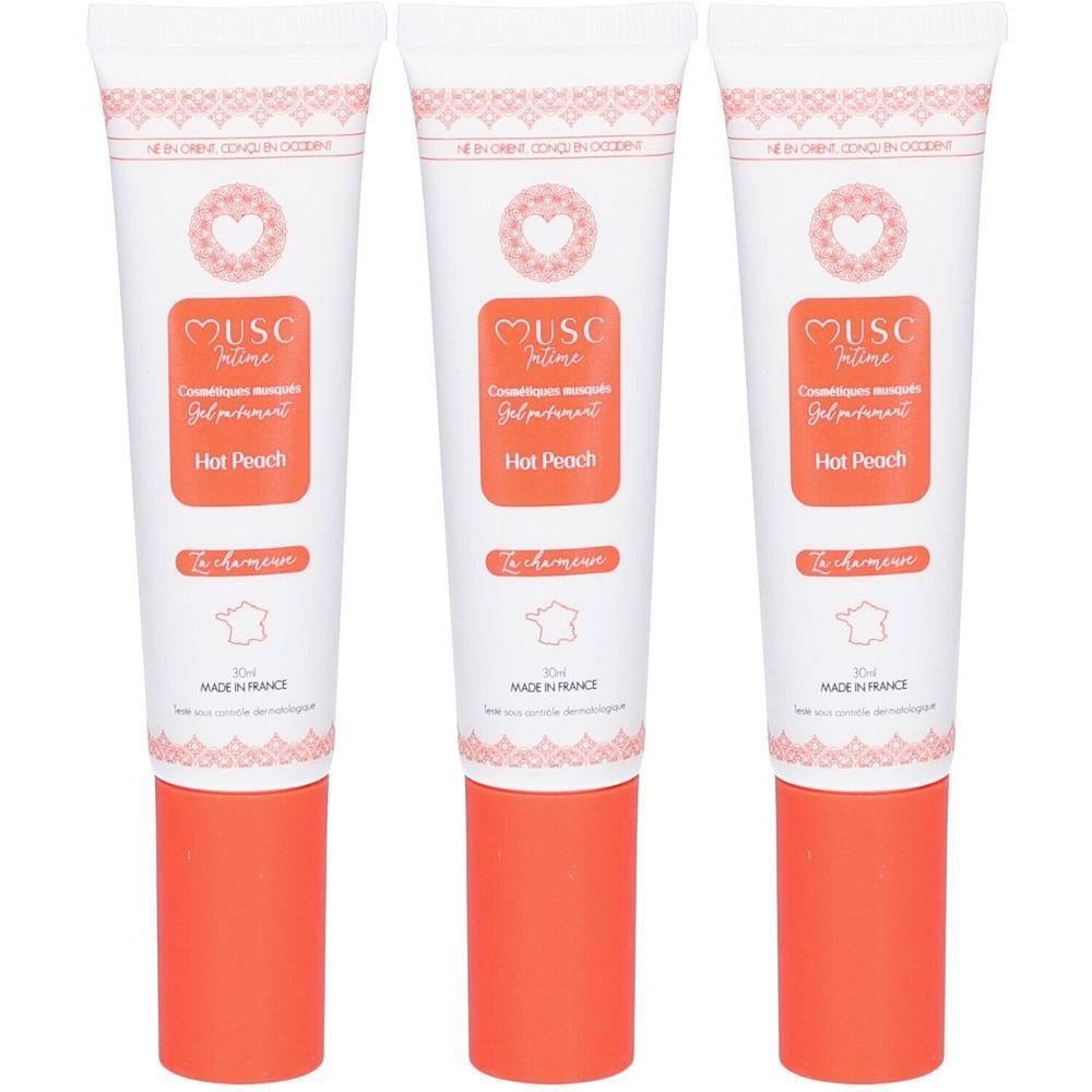 Trois tubes de Musc Intime Gel Parfumant Hot Peach avec bouchons orange. Fabriqué en France.