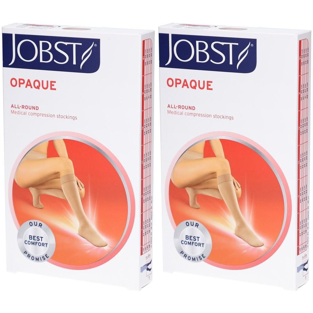 Twee dozen JOBST Opaque compressiekousen in beige. Een been met kous is afgebeeld.