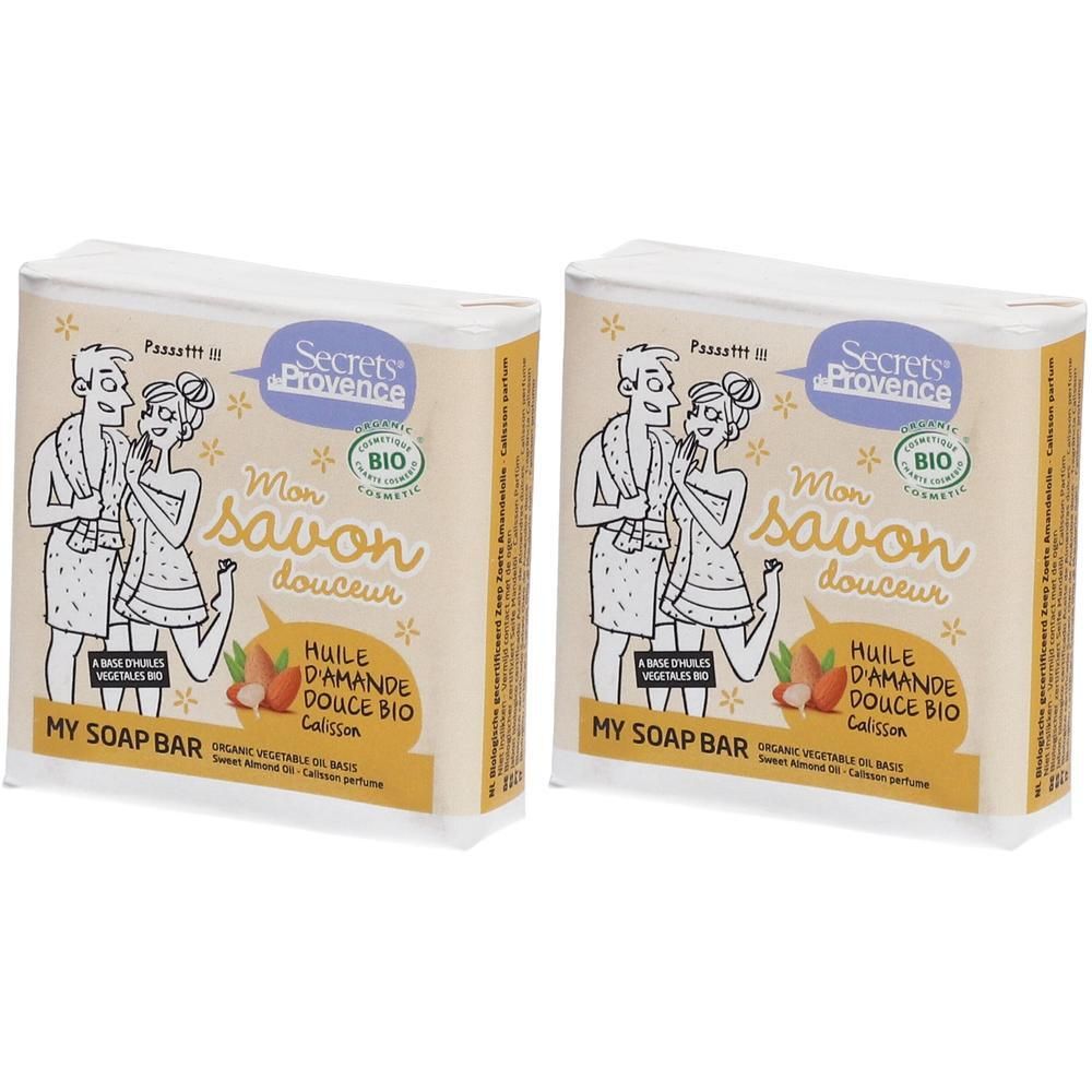 Twee pakken "Mon Savon Douceur" biologische zeep met amandelolie. Toont een stel in badjassen.