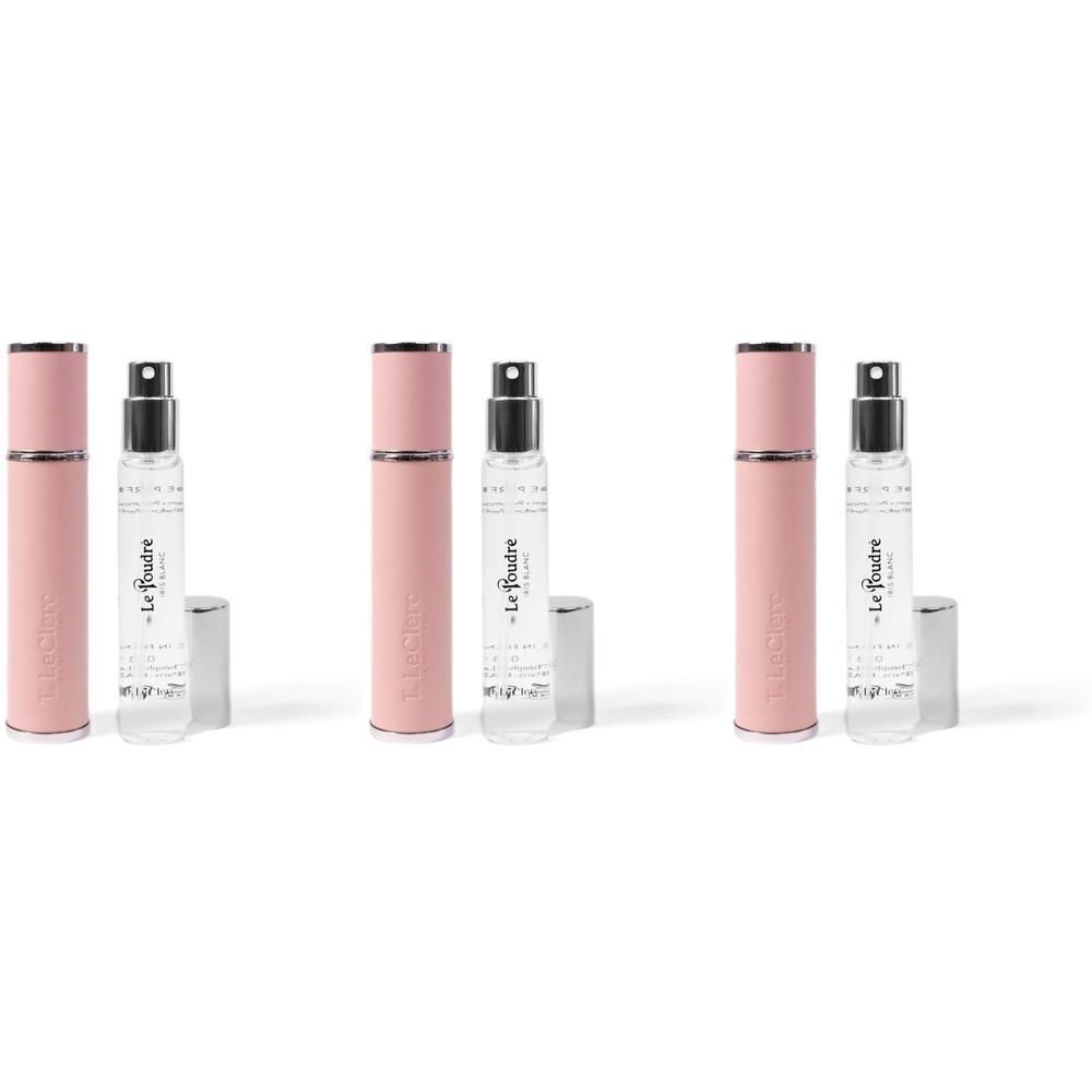 Trois vaporisateurs de parfum T. LeClerc roses avec capuchons argentés.