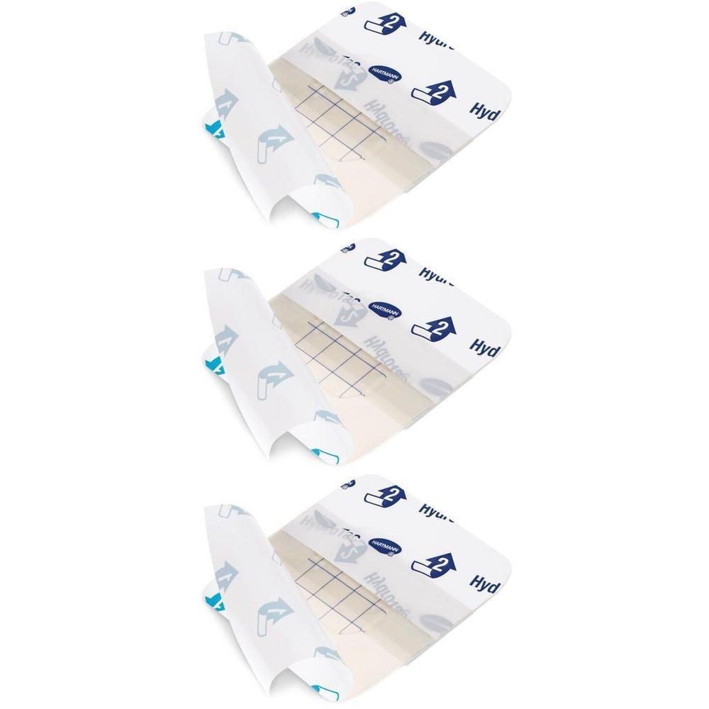 Drie steriele HydroTac kompressen, transparant, met raster en blauwe markeringen.