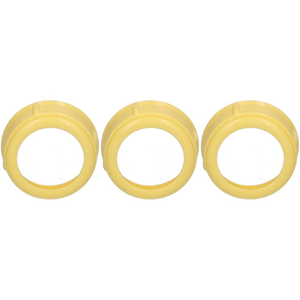 Drie gele, gegroefde ringen, onderdeel van een Medela Special Needs Feeder.