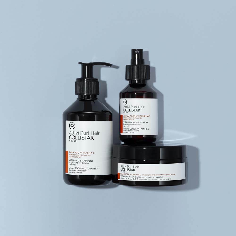 Shampoing, Spray Gloss Crème et Masque Collistar Attivi Puri Hair Vitamine C dans des flacons et pots bruns.