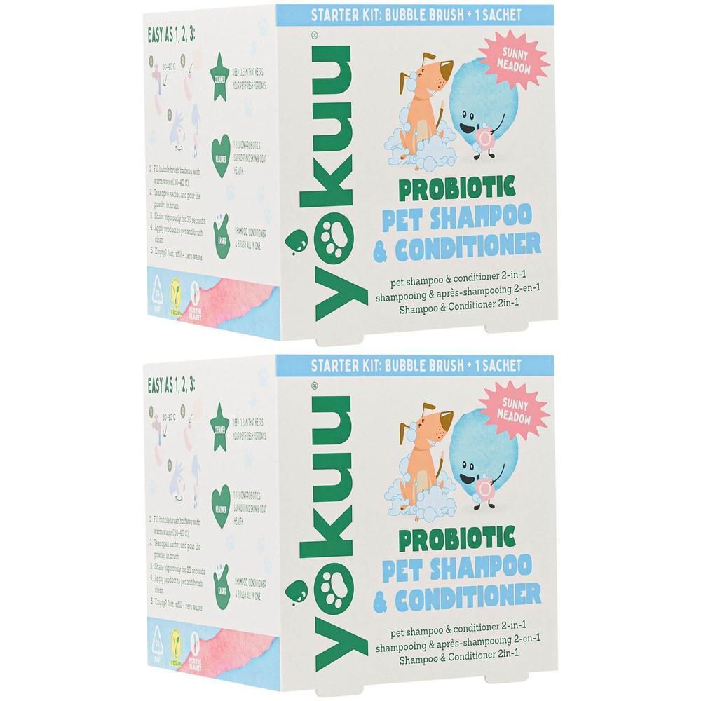 Twee Yokuu starterkits voor probiotische huisdierenshampoo en conditioner. Elke kit bevat een borstel en een sachet.