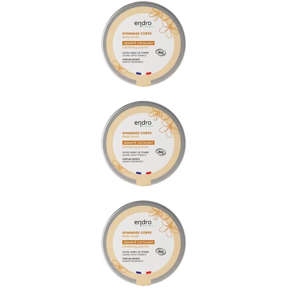 Trois boîtes rondes Endro Gommage Corps avec étiquettes indiquant 'Granité exfoliant' et 'Exfoliating granita'.
