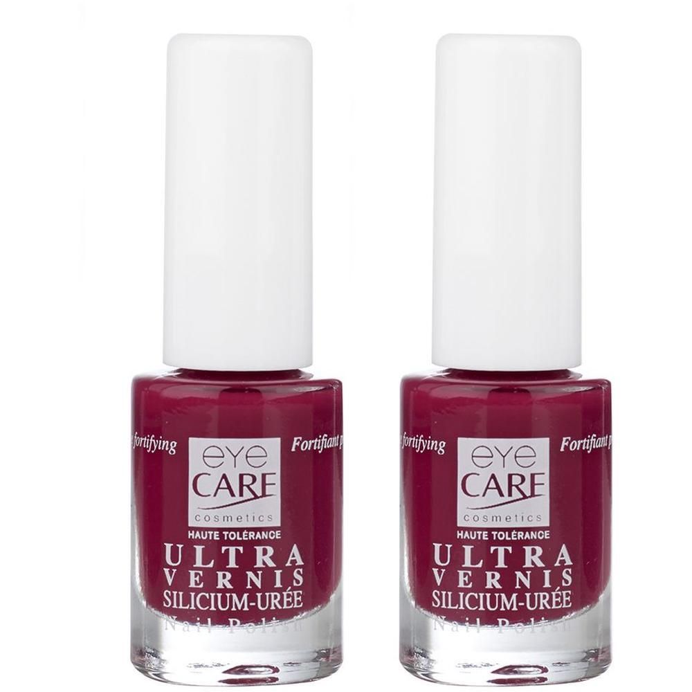 Twee flacons Eye Care Ultra Vernis Silicium-Uree nagellak in frambooskleur.