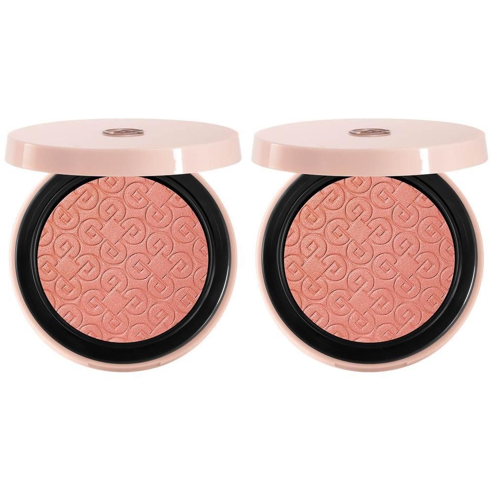 Twee open poederdoosjes met perzikkleurige blush.