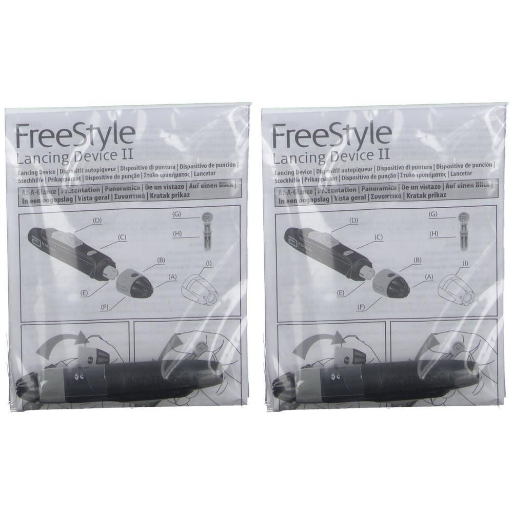 Deux autopiqueurs Abbott FreeStyle Lancing Device II sous emballage plastique avec instructions.