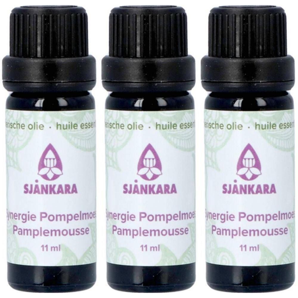 Trois flacons en verre foncé avec bouchons noirs, contenant de l'huile essentielle de pamplemousse. Chaque flacon contient 11 ml.