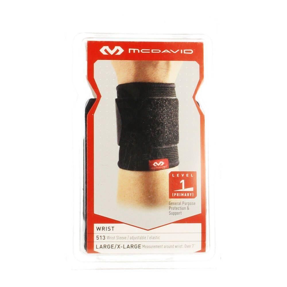 Zwarte McDavid polsbrace, maat L/XL, verstelbaar en elastisch.