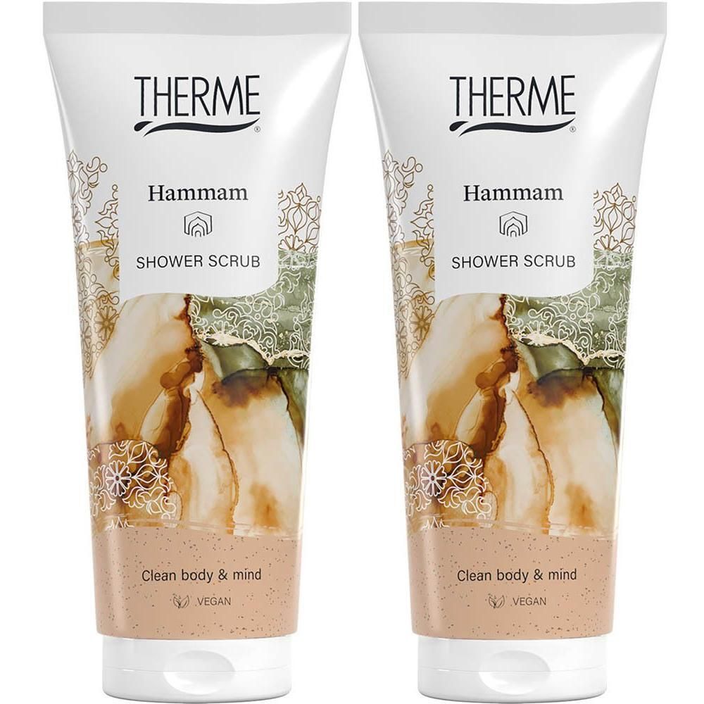 Deux tubes de Gommage Douche Hammam Therme à l'argile. Tubes blancs avec motifs arabesques et informations produit.