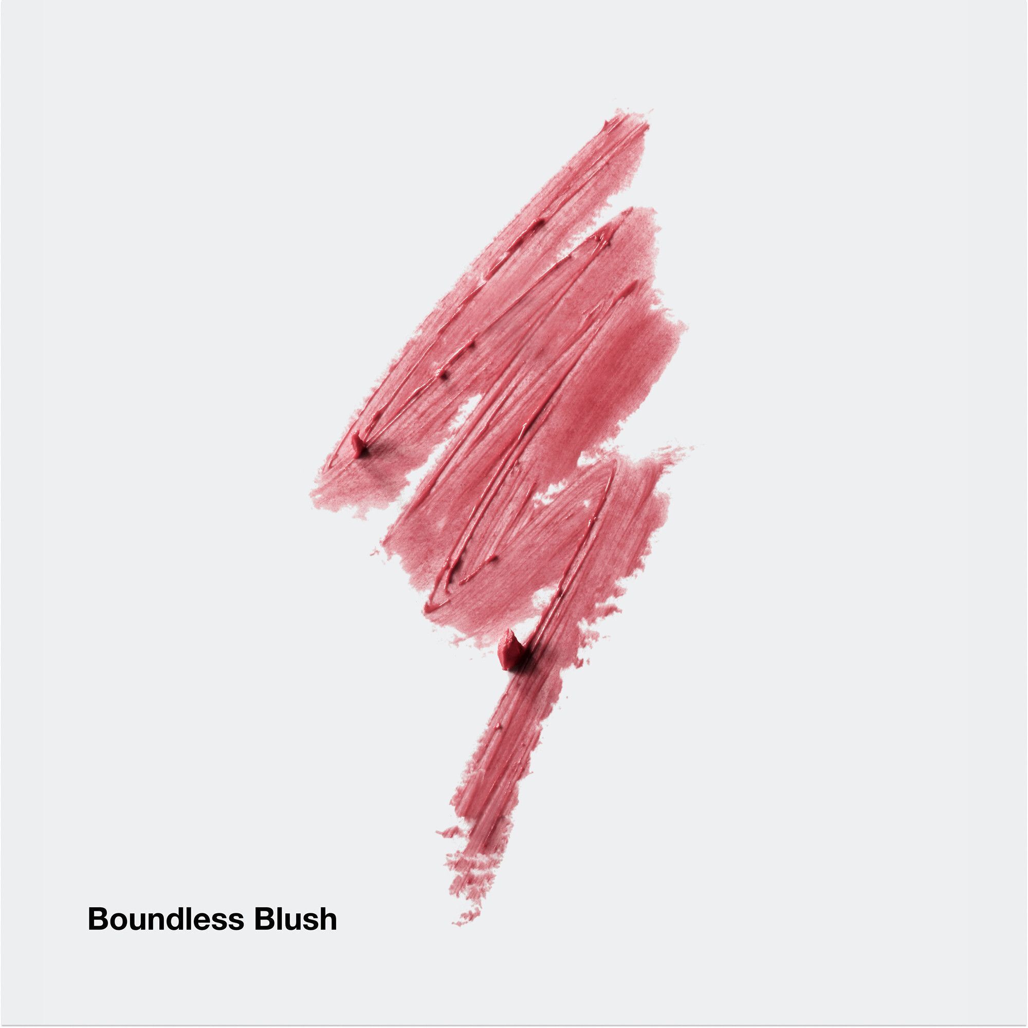 Échantillon de rouge à lèvres teinte rosée, nommé 'Boundless Blush'.