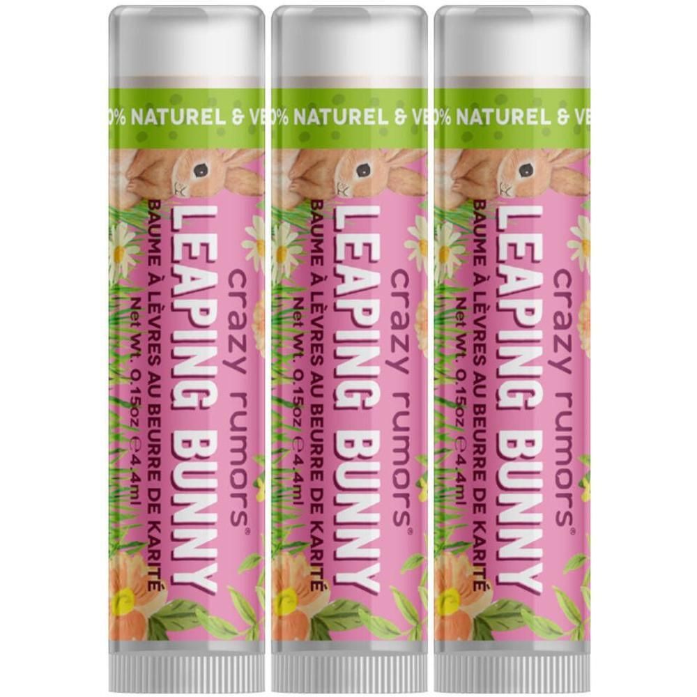 Drie lippenbalsemstiften op roze verpakking met konijnenmotief. "Leaping Bunny" en "Crazy Rumors" zijn zichtbaar.