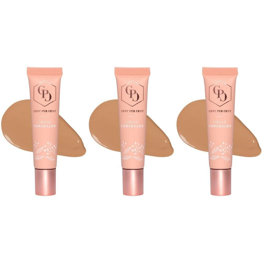 Trois tubes de correcteur liquide avec un échantillon de maquillage appliqué.