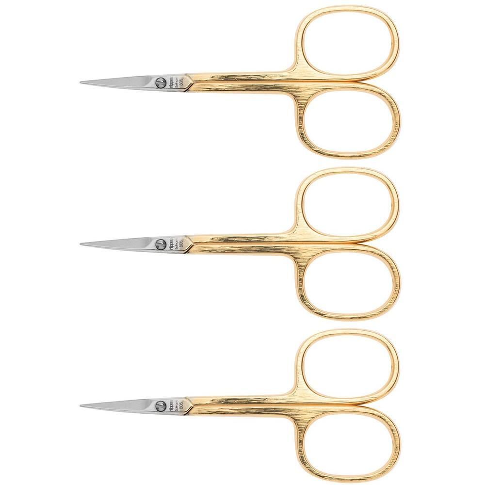 Drie gouden nagelschaartjes met precieze bladen en ergonomische handvatten.