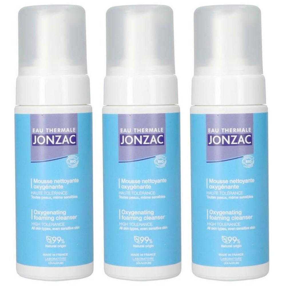 Trois flacons de Jonzac Mousse Nettoyante Oxygénante avec pompe. Étiquettes bleu clair avec informations produit.