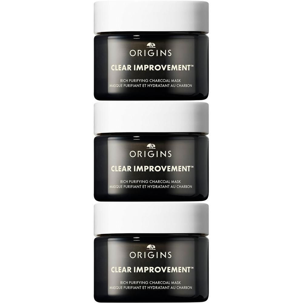 Drie potjes Origins Clear Improvement gezichtsmasker met actieve kool.
