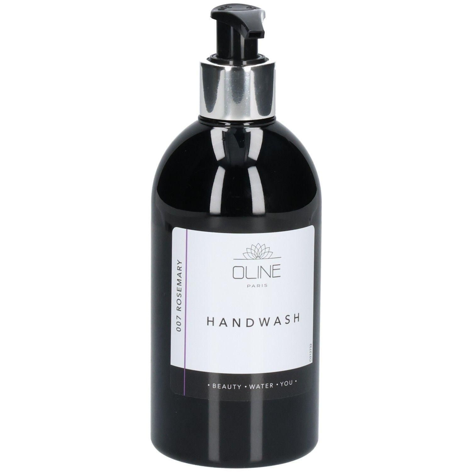 Zwarte pompfles met zilverkleurige pomp, etiket met "OLINE HANDWASH" en "ROSEMARY".